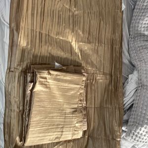 Gold colored curtains